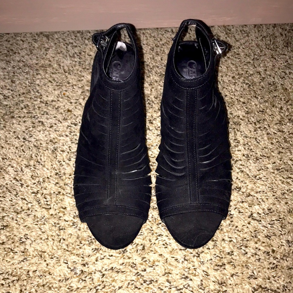 Black faux suede open back/open toe heels by Carlos Santana. Worn once. Size 9M